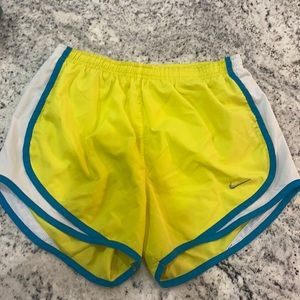 Yellow and teal Nike shorts